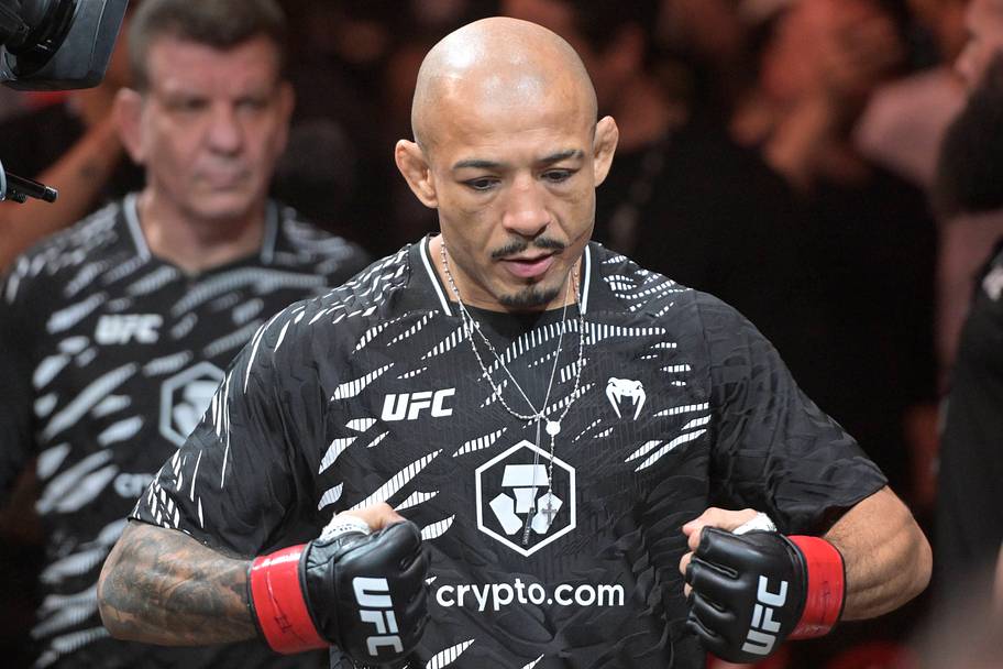 Jose Aldo (red gloves) prepares to fight Aiemann Zahabi (not pictured) during UFC 315 at Bell Centre.
