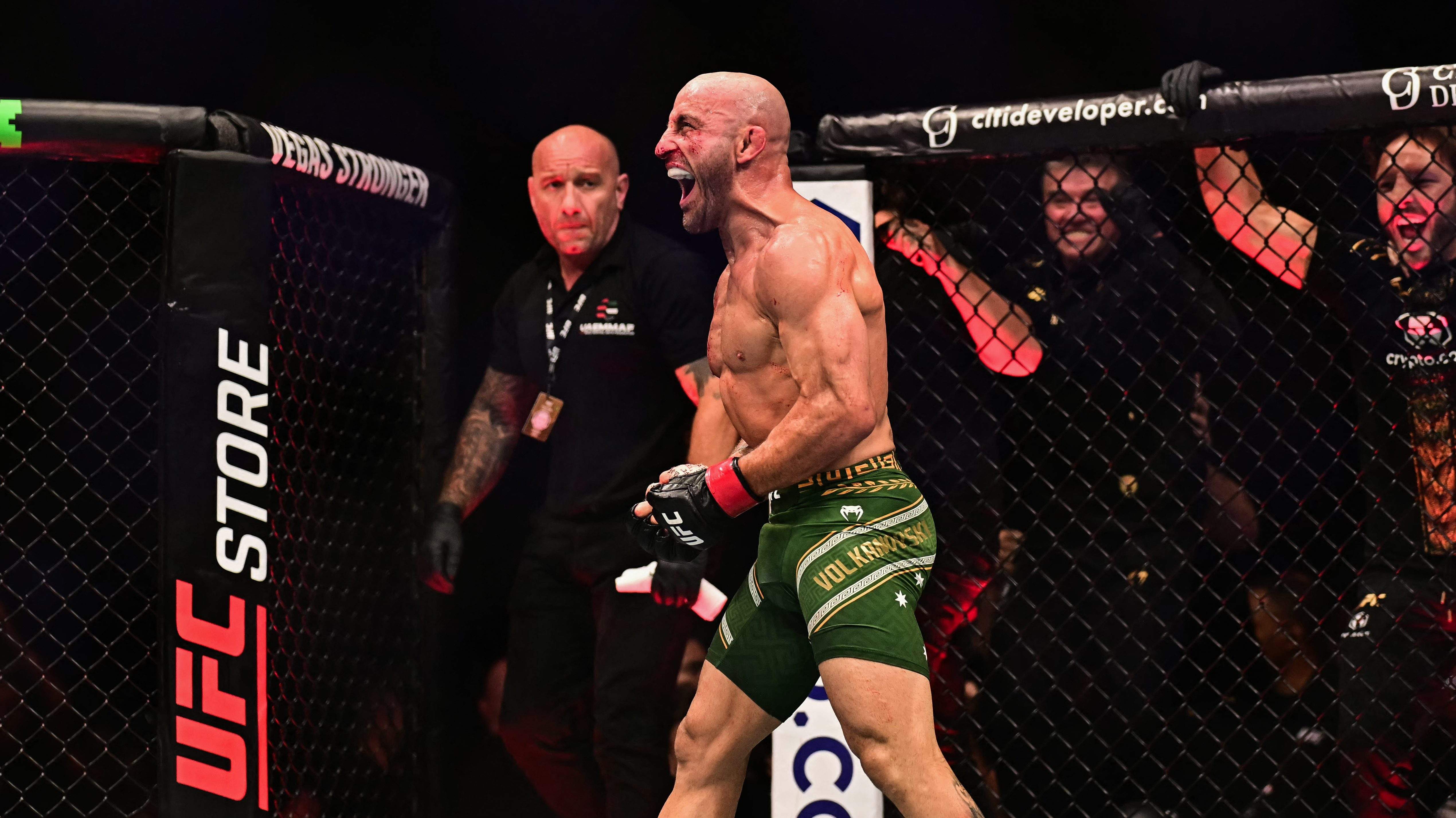 Australia's Alexander Volkanovski reacts as he competes against Russia's Movsar Evloev in their men's featherweight fight during the UFC Fight Night event at Etihad Arena in Abu Dhabi early on October 25, 2026. (Photo by Giuseppe CACACE / AFP via Getty Images)