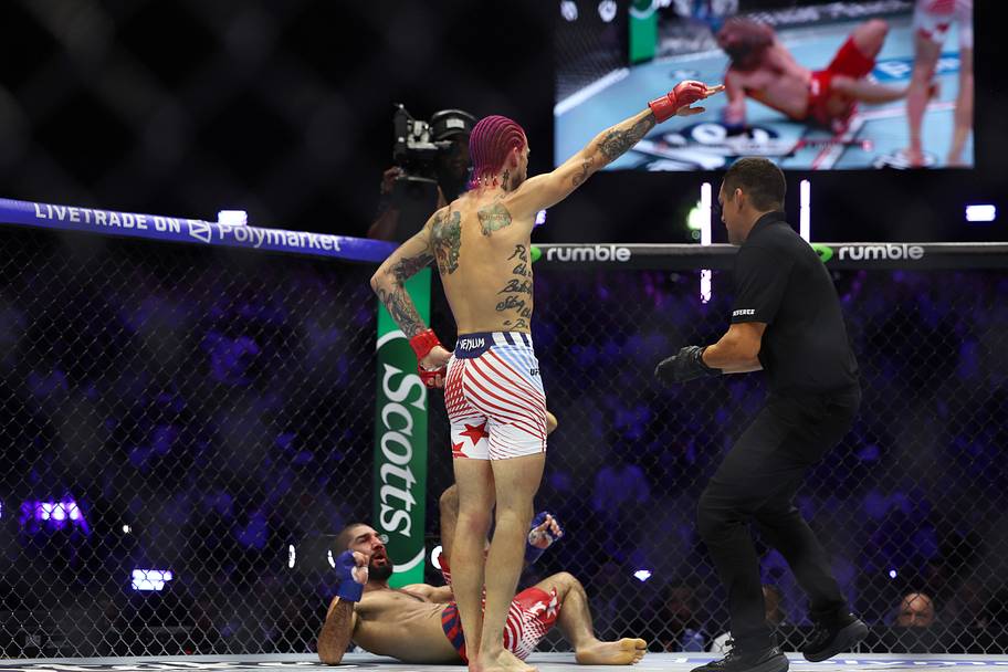 Sean O'Malley (red gloves) celebrates after winning against Aiemann Zahabi (blue gloves) during UFC Freedom 250 at White Hous