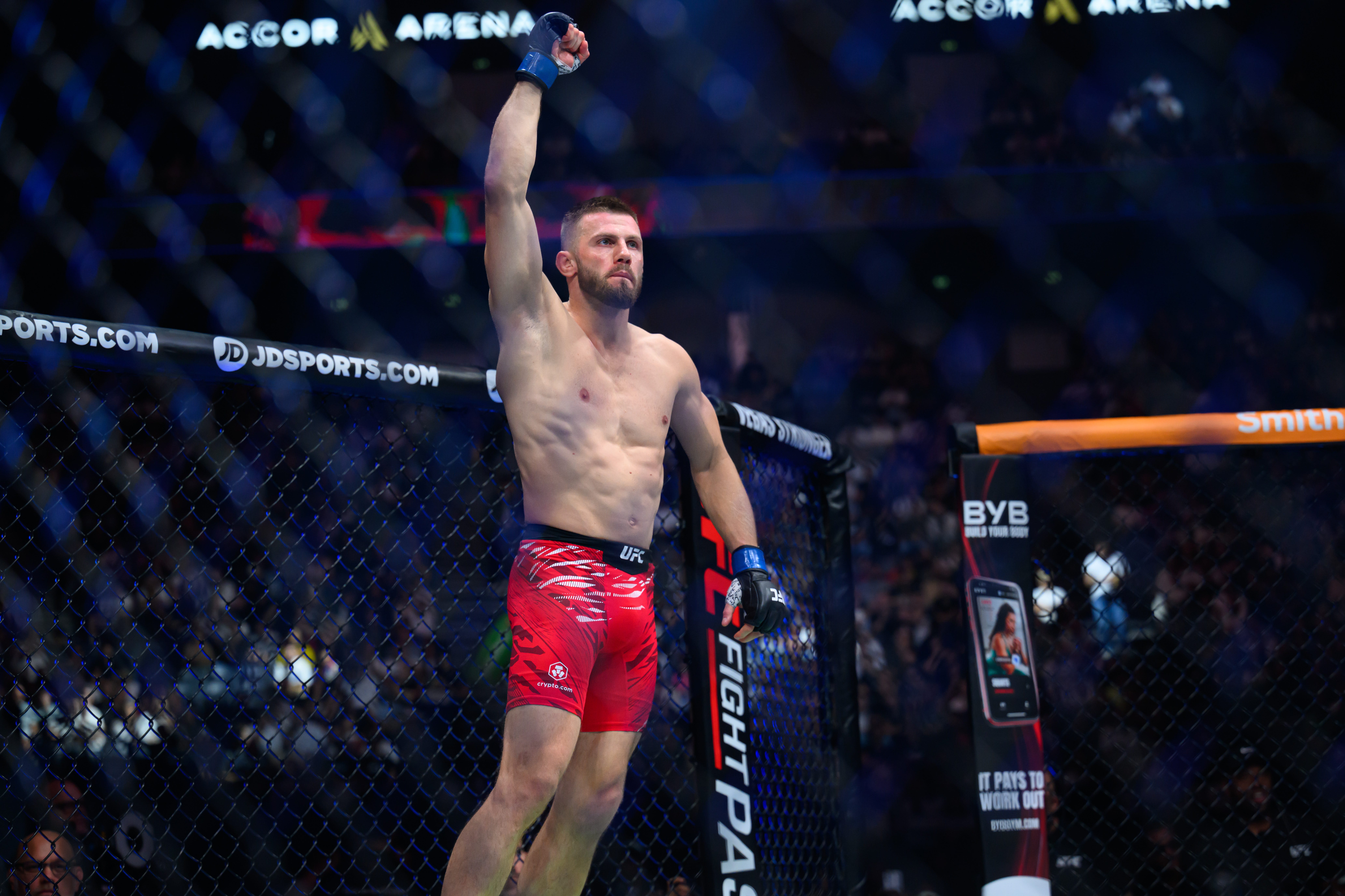 Sep 6, 2025; Paris, FRANCE; Robert Bryczek (blue gloves) reacts before the fight against Brad Tavares (red gloves) during UFC Fight Night at Accor Arena. Mandatory Credit: Per Haljestam-Imagn Images
