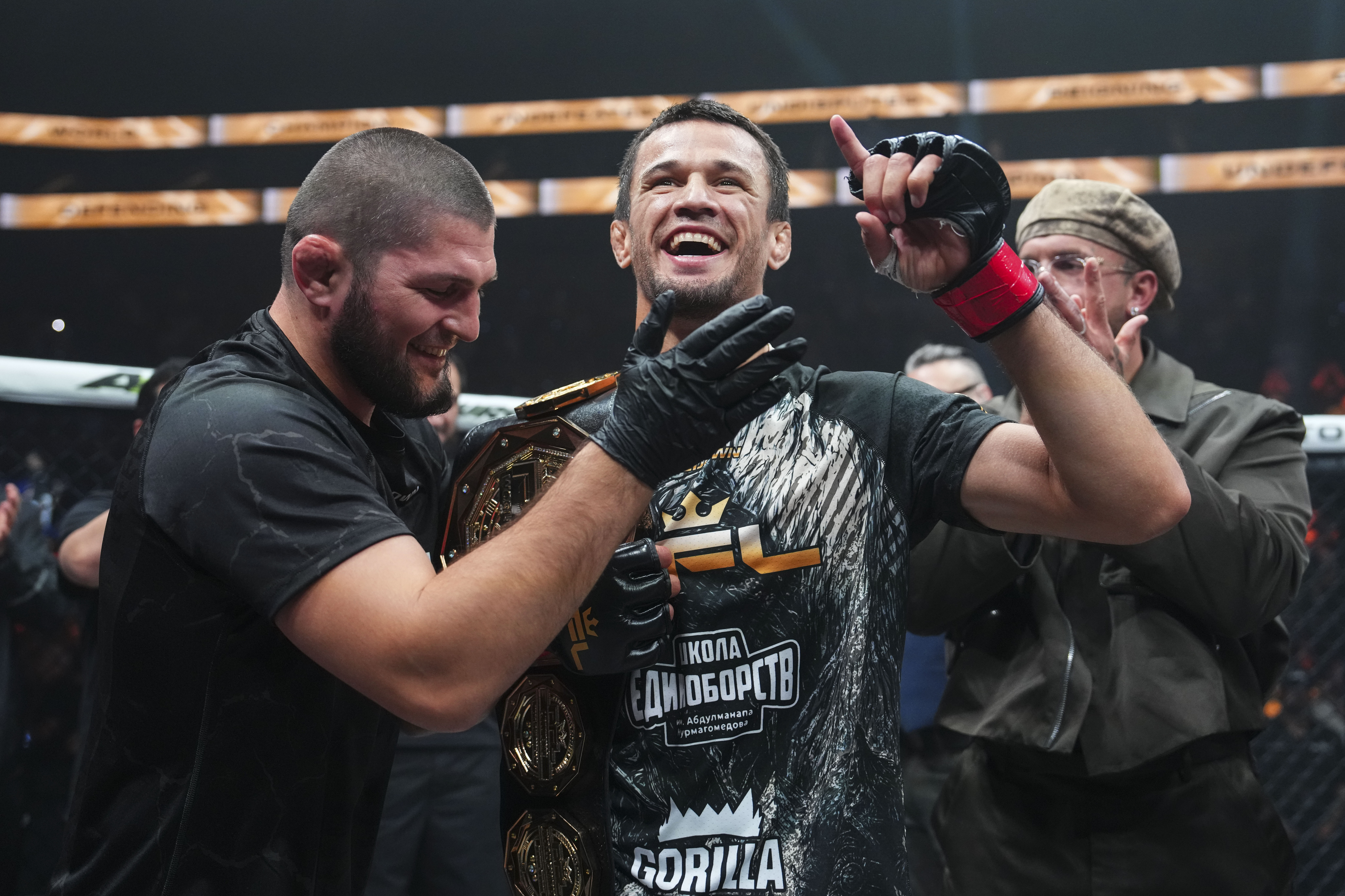 BELMONT PARK, NY - JULY 31: Usman Nurmagomedov celebrates with Khabib Nurmagomedov after fighting against Archie Colgan during PFL New York at the UBS Arena on July 31, 2026 in Belmont Park, New York. (Photo by Cooper Neill/Getty Images)