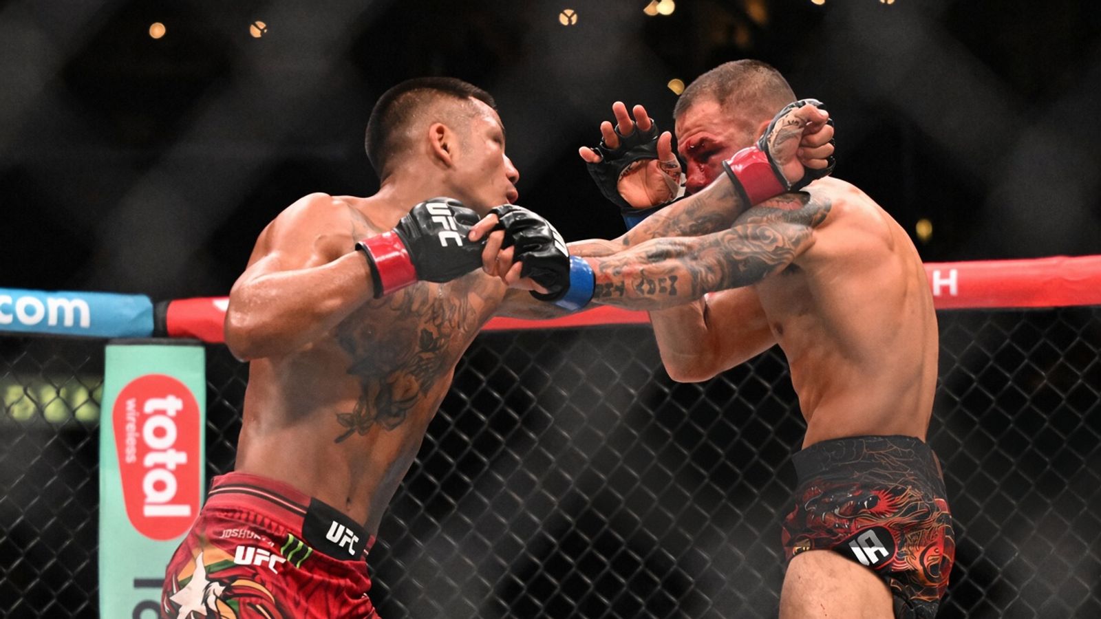Sep 19, 2026; Los Angeles, California, USA; Joshua Van (red gloves) fights Alexandre Pantoja (blue gloves) during UFC 331 at Crypto.com Arena.