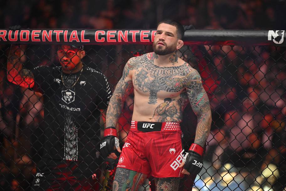 Sean Brady (red gloves) prior to the fight against Joaquin Buckley (blue gloves) during UFC 328 at Prudential Center.