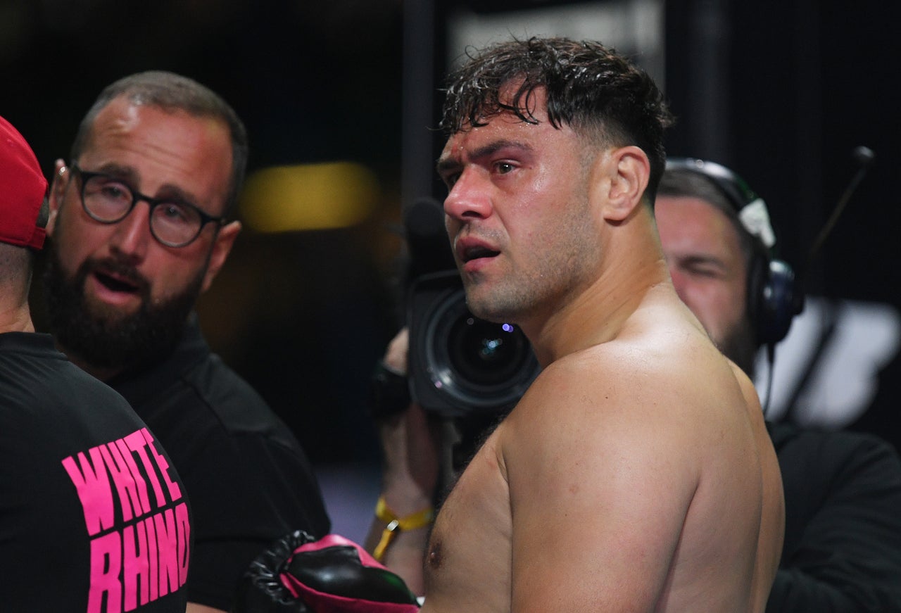 A confused-looking Allen during Carty’s time receiving assistance outside the ring (Getty)