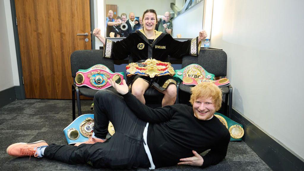 Katie Taylor and Ed Sheeran pose with her world titles