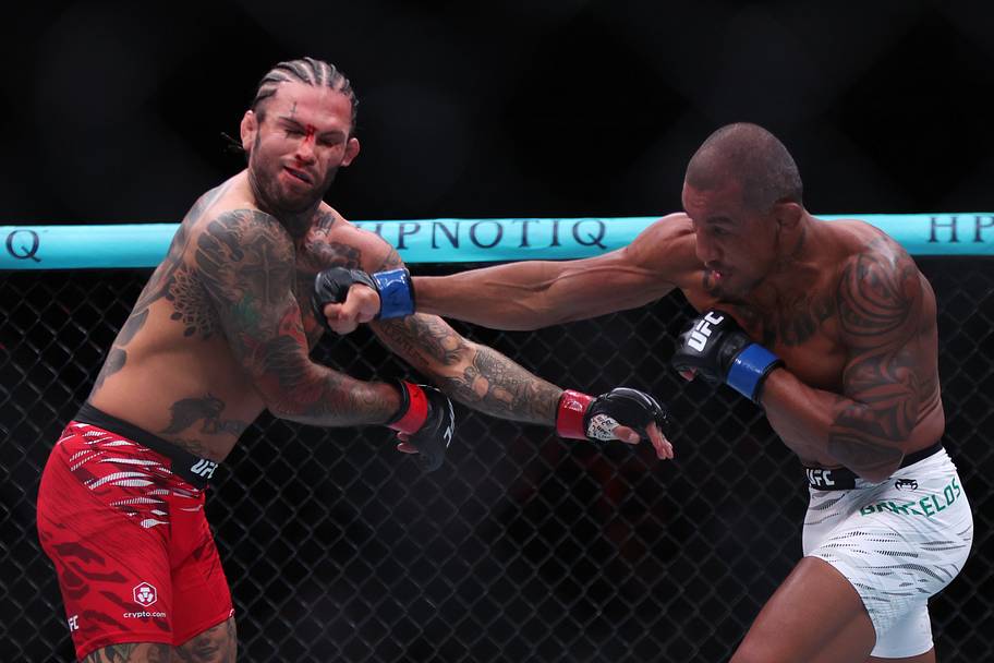 Cody Garbrandt (red gloves) fights Raoni Barcelos (blue gloves) during UFC Fight Night at State Farm Arena.