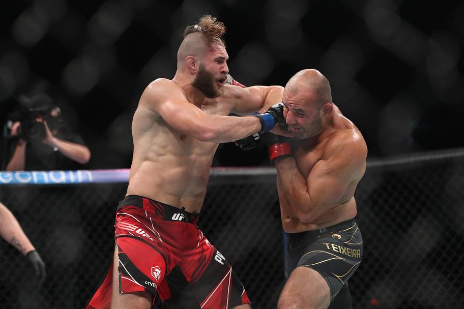 Jiri Prochazka (blue gloves) reacts after the fight against Glover Teixera (red gloves) during UFC 275 at Singapore Indoor St