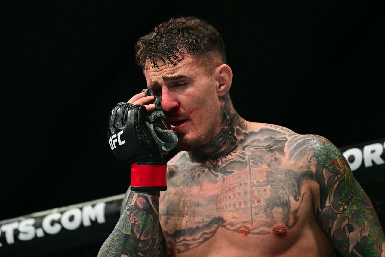 Tom Aspinall was left badly injured by Gane’s eye pokes (AFP)