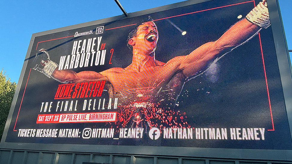 Poster of boxer Nathan Heaney with arms spread, promoting his fight on 26 September