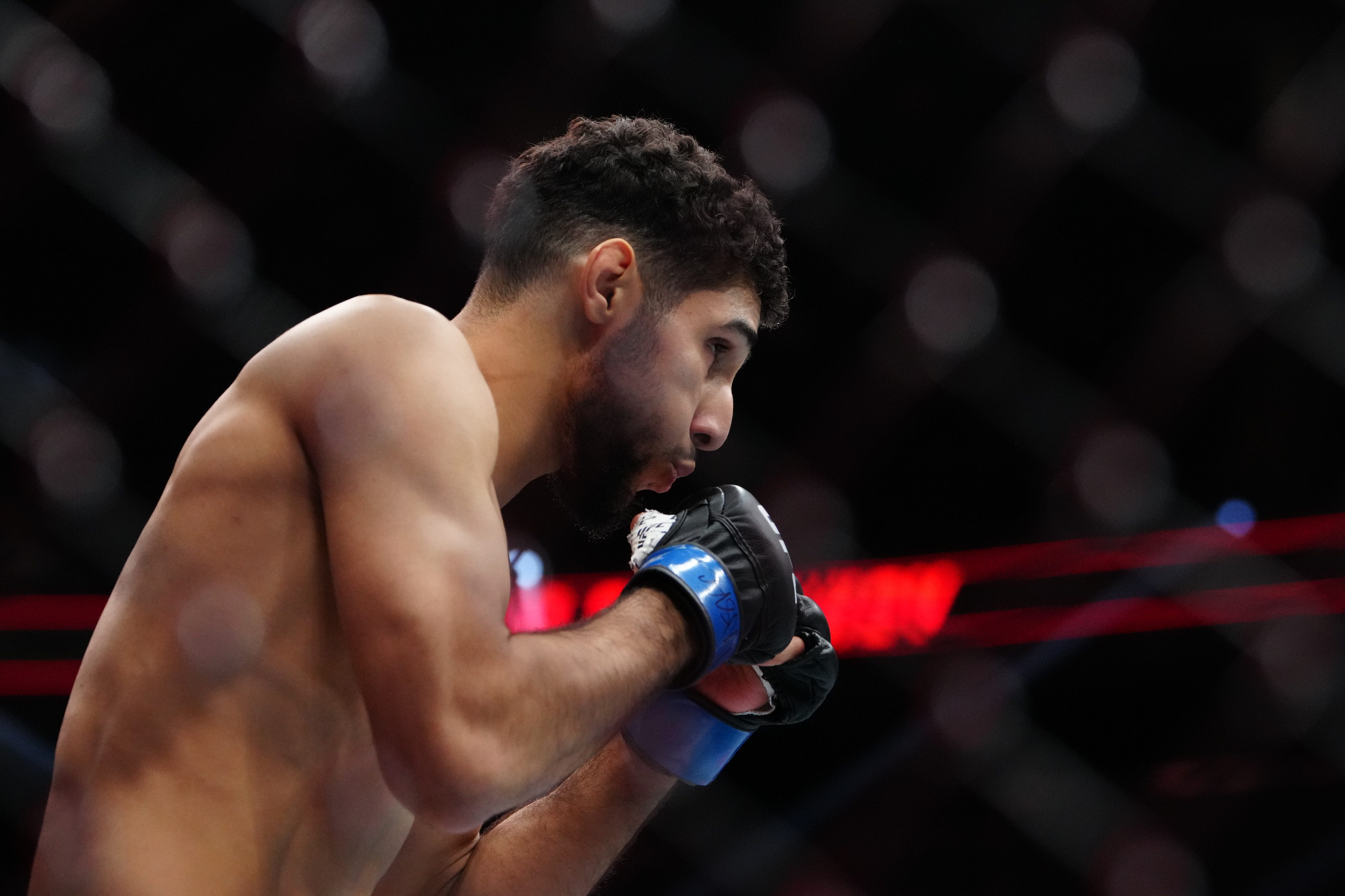Dec 6, 2025; Las Vegas, Nevada, UNITED STATES; Fares Ziam (blue gloves) prior to the fight against Nazim Sadykhov (red gloves) during UFC 323 at T-Mobile Arena. Mandatory Credit: Stephen R. Sylvanie-Imagn Images