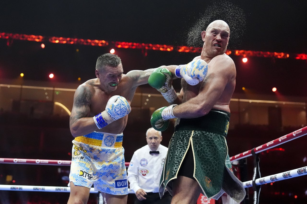 Fury (right) twice lost on points to Oleksandr Usyk (left) (PA Wire)