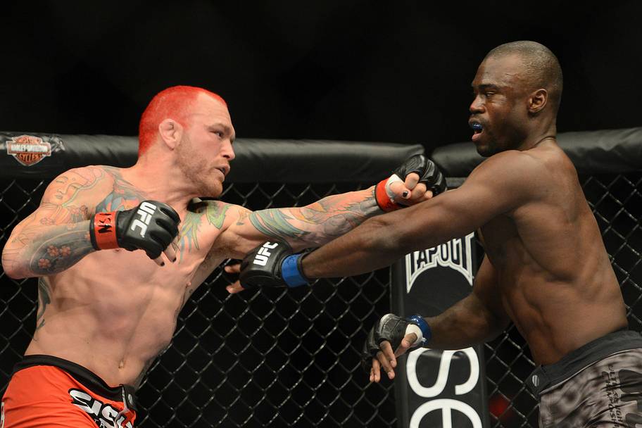 Chris Leben (red gloves) and Uriah Hall (blue gloves) fight during their UFC middleweight bout at the MGM Grand Garden Arena.