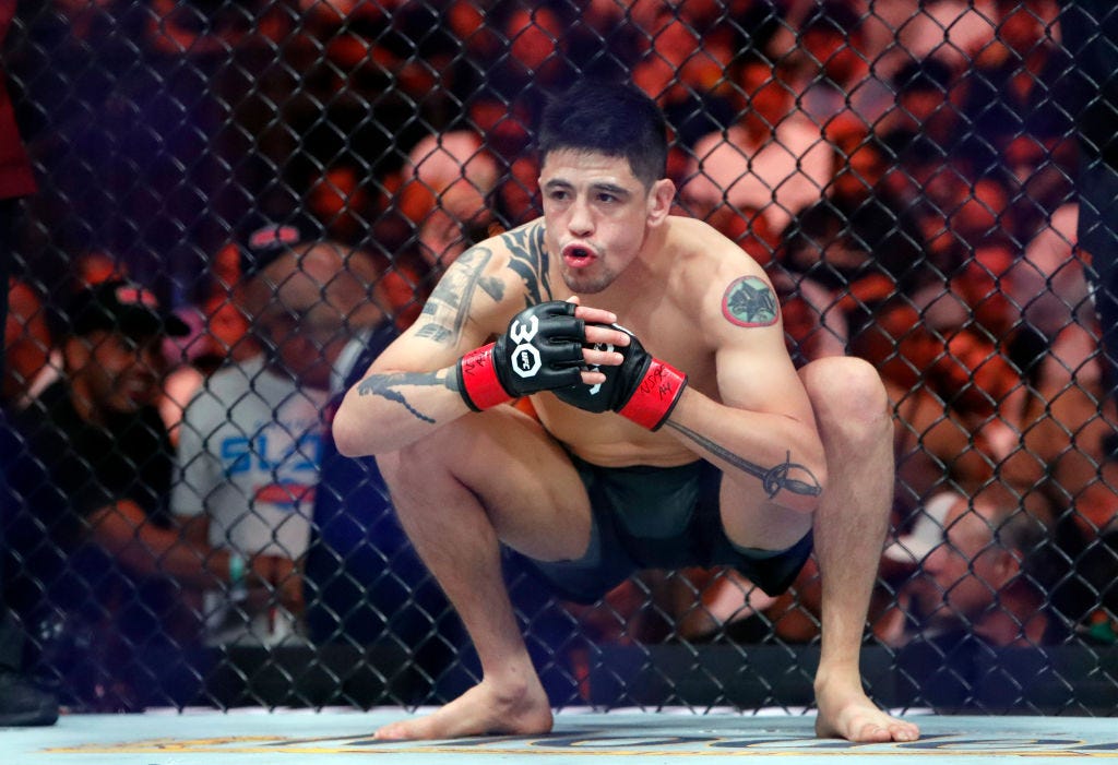 UFC flyweight champion Brandon Moreno waits for the start of his title defense against Alexandre Pantoja during UFC 290 at T-Mobile Arena on July 08, 2023 in Las Vegas, Nevada. Pantoja won the title by split decision.