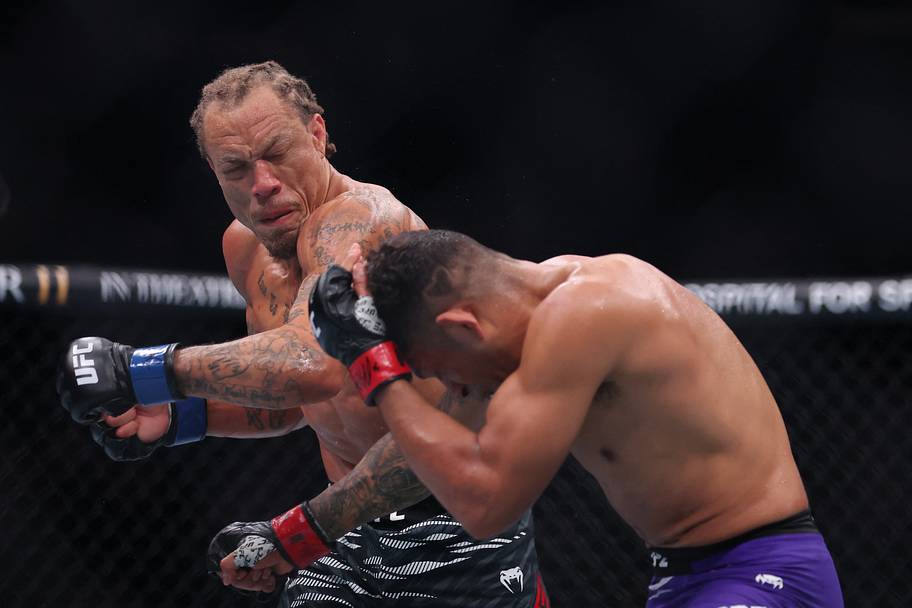 Jonathan Martinez (red gloves) fights Marcus McGhee (blue gloves) in the bantamweight bout during UFC 309 at Madison Square G