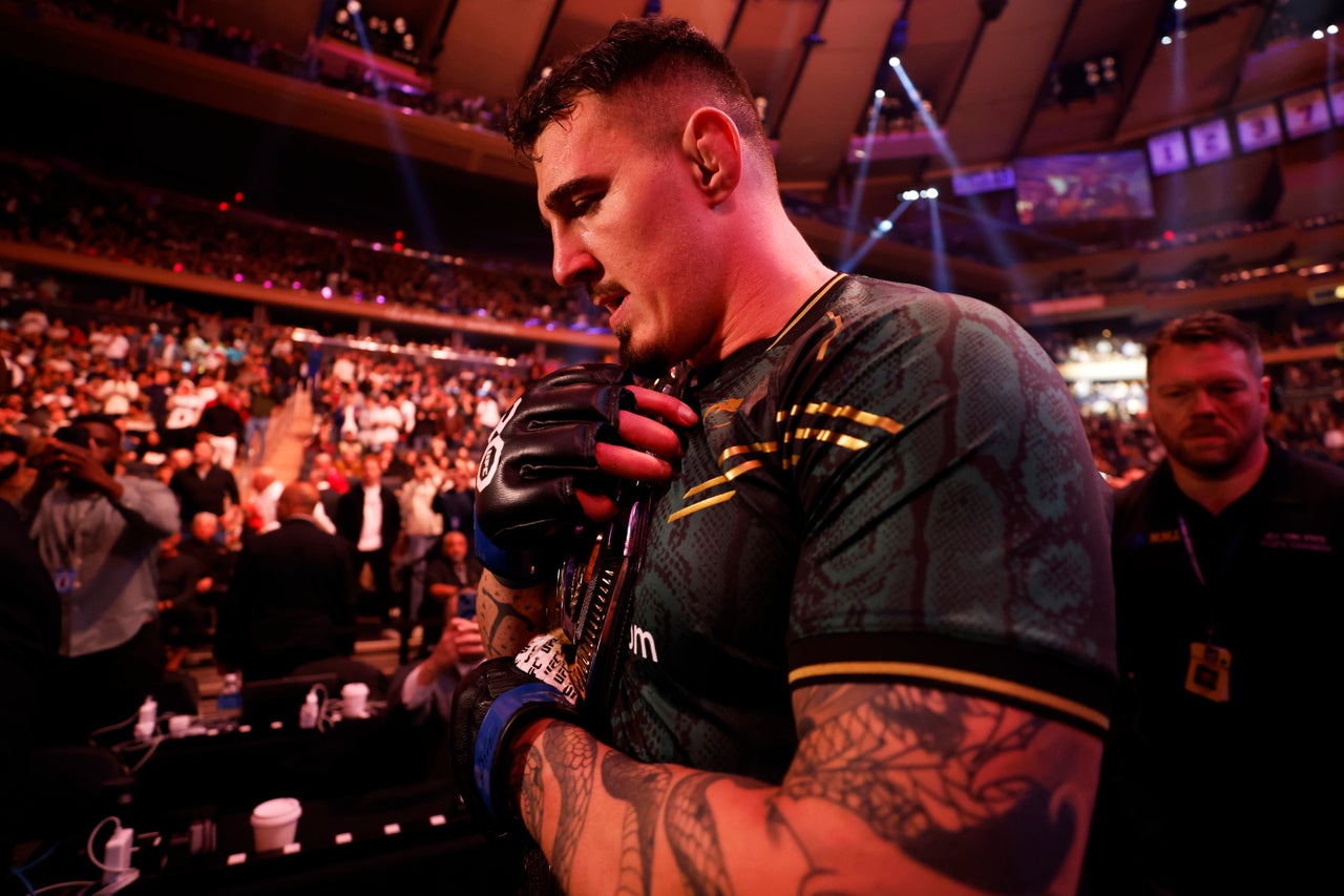 Aspinall after winning the interim UFC heavyweight title in 2023 (Getty)