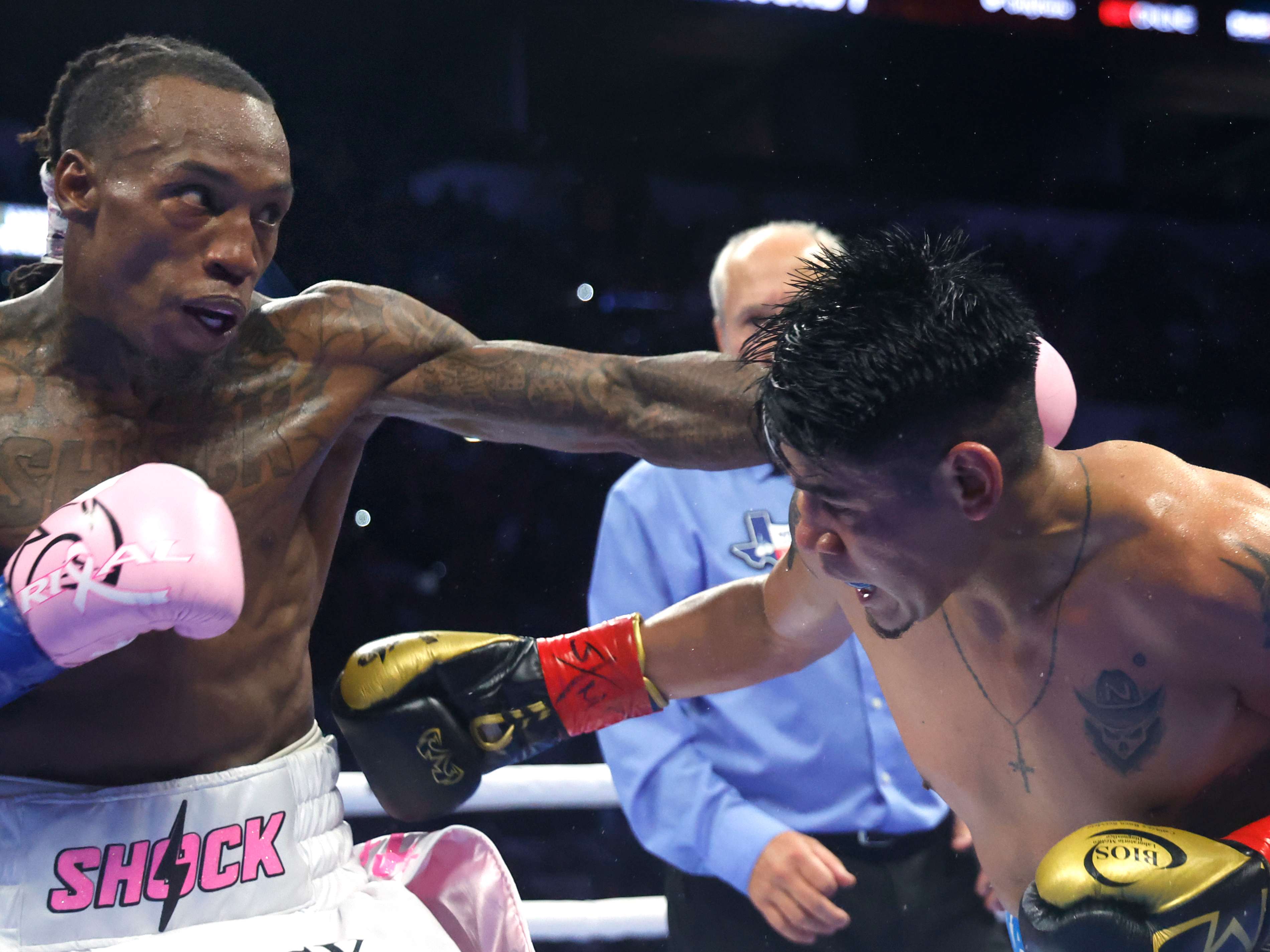 SAN ANTONIO, TX -OCTOBER 24: O'Shaquie Foster throws a left at Emmanuel Navarrete during their super featherweight title unification bout at Frost Bank Center on October 24, 2026 in San Antonio, Texas. (Photo by Ronald Cortes/Getty Images)