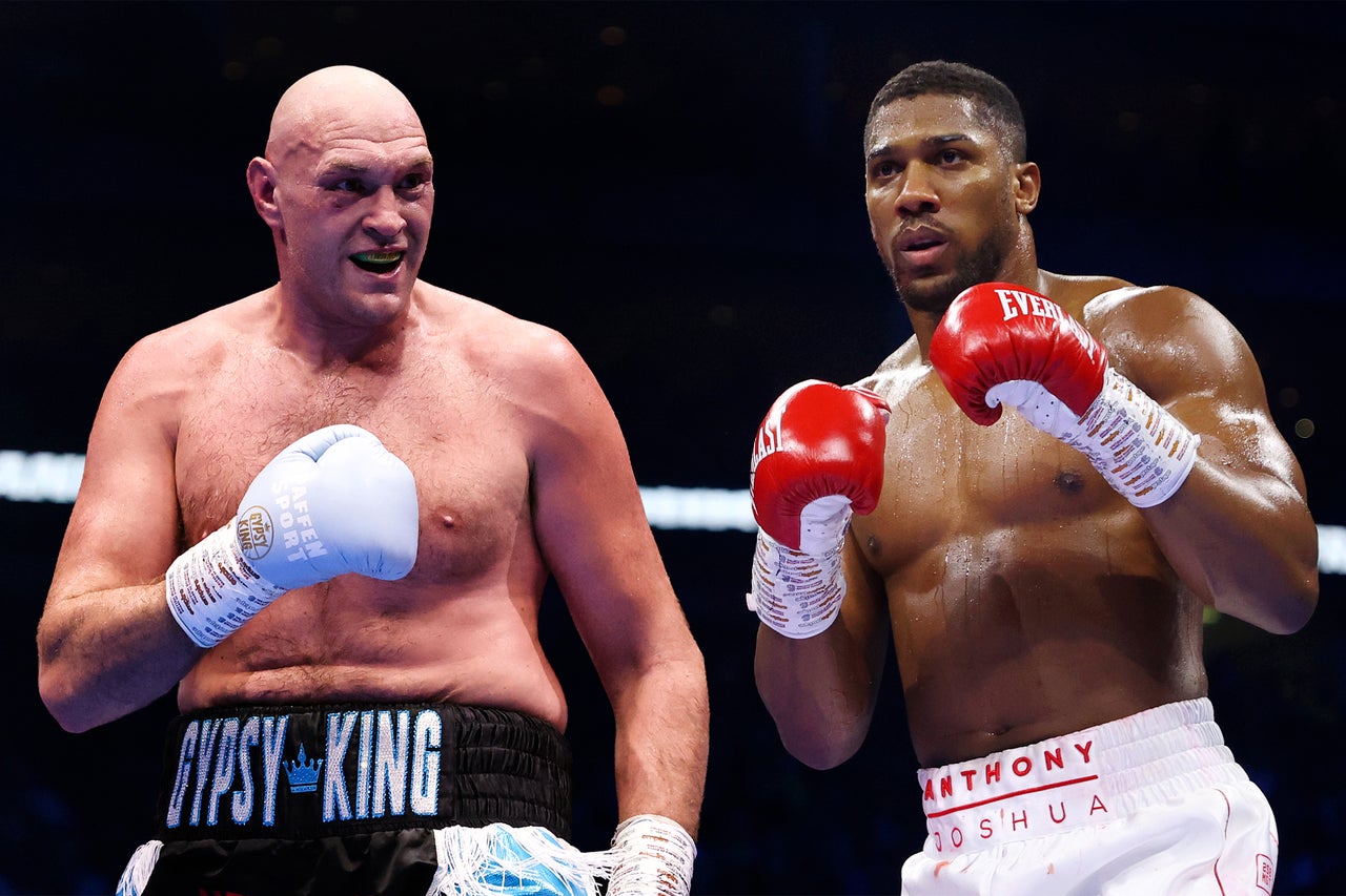 Tyson Fury (left) and Anthony Joshua will do battle after years of waiting (Getty)