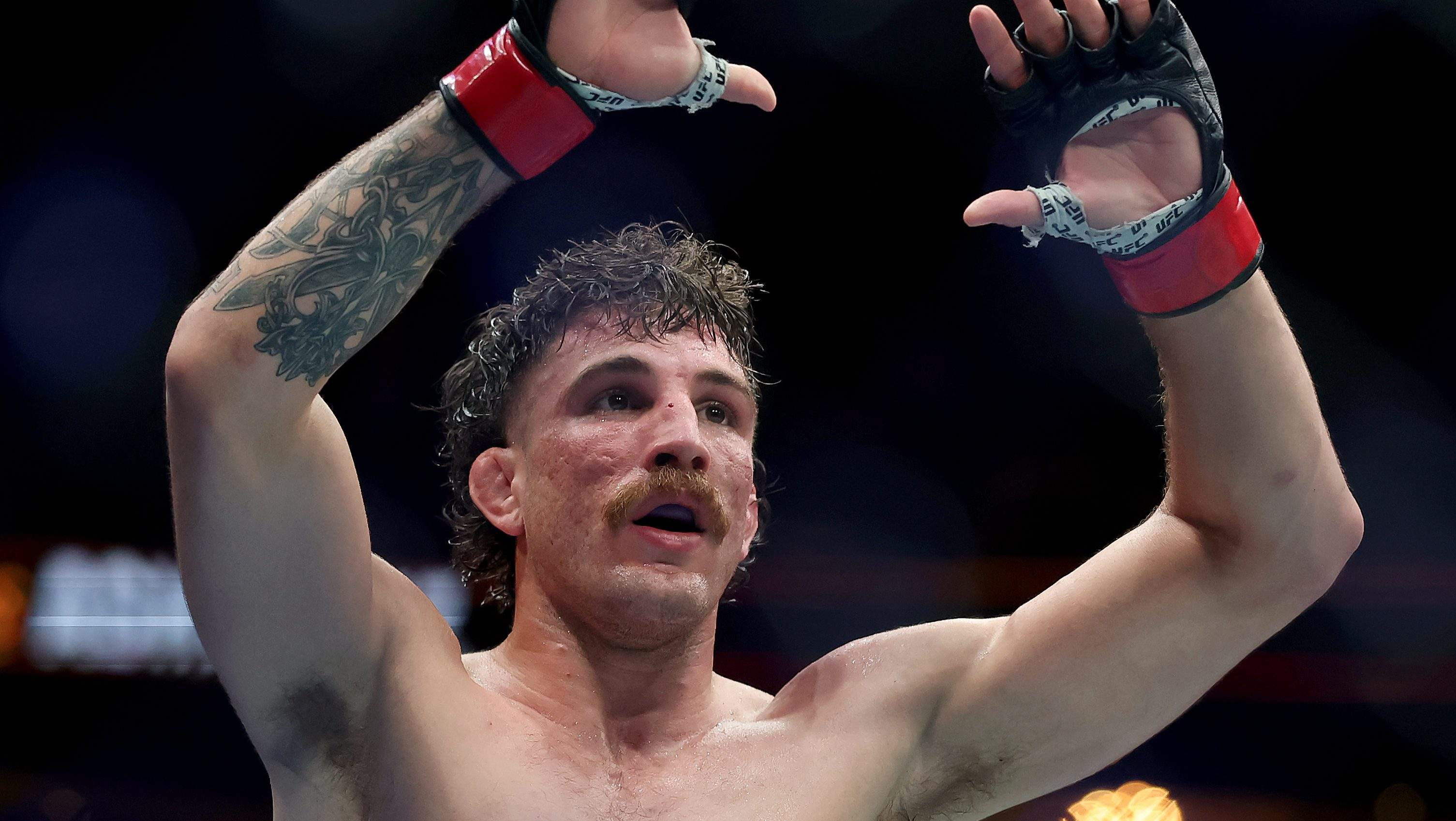 NEWARK, NEW JERSEY - JUNE 07: Quillan Salkilld of Australia reacts after defeating Yanal Ashmouz of Israel in the lightweight bout during UFC 316 at the Prudential Center on June 07, 2025 in Newark, New Jersey. (Photo by Elsa/Getty Images)