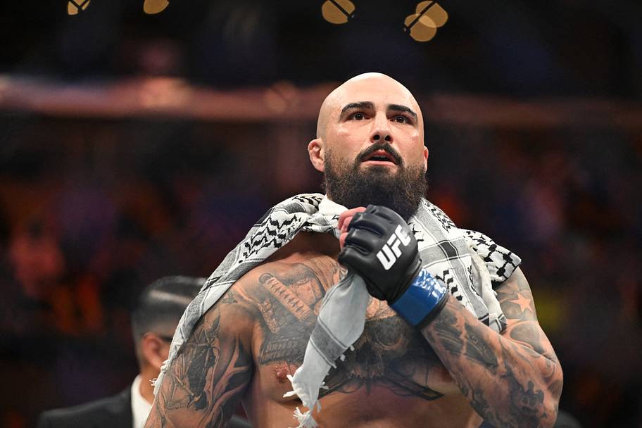 Sean Sharaf (blue gloves) reacts after defeating Gable Steveson (not pictured) during UFC 331 at Crypto.com Arena.