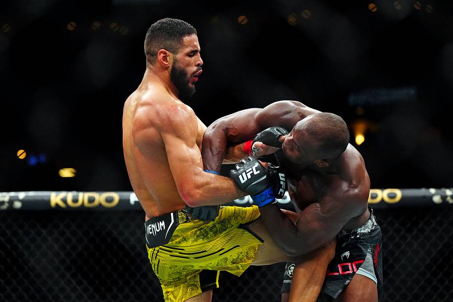 Gabriel Bonfim (red gloves) fights Ange Loosa (blue gloves) during UFC Fight Night at Ball Arena.
