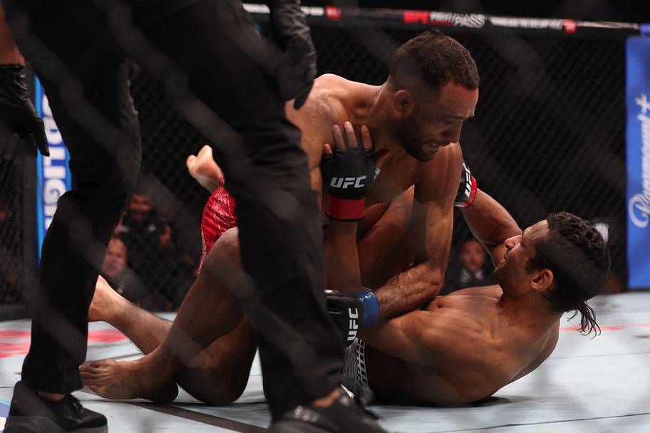 Mandel Nallo (red gloves) fights Jai Herbert (blue gloves) during UFC Fight Night at Canada Life Centre.