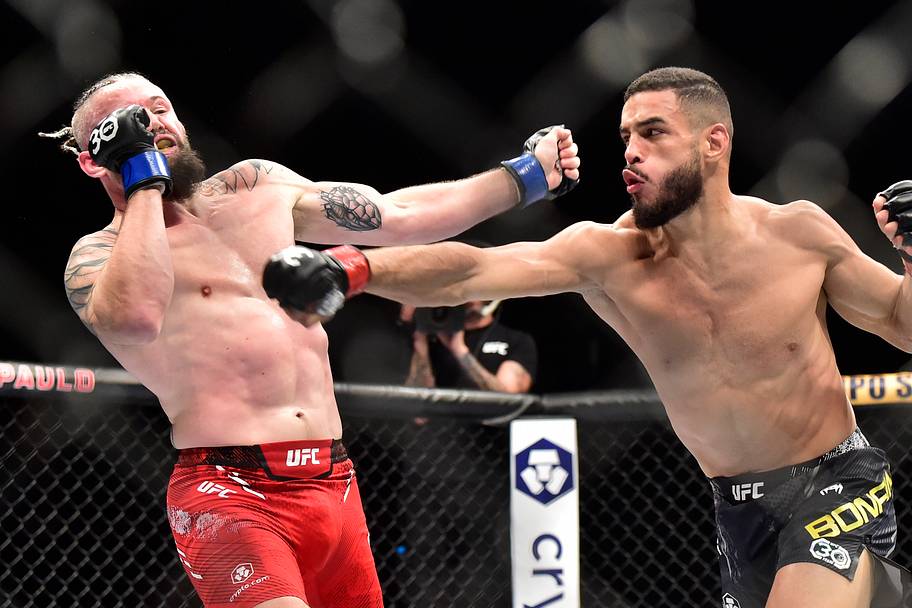 Nicolas Dalby (blue gloves) fights Gabriel Bonfim (red gloves) during the UFC Fight Night at Ibirapuera Arena.