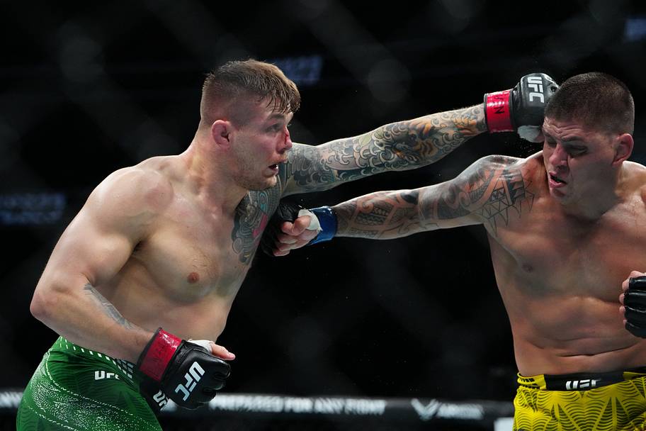 Marvin Vettori (red gloves) fights Brunno Ferreira (blue gloves) during UFC 323 at T-Mobile Arena.