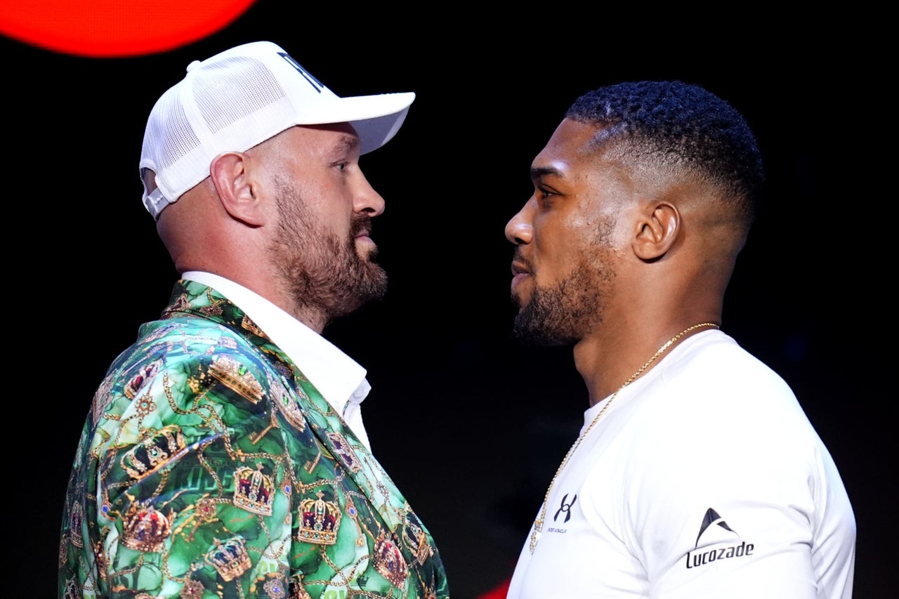 Tyson Fury and Anthony Joshua will be fighting in the early hours of the morning (PA Wire)
