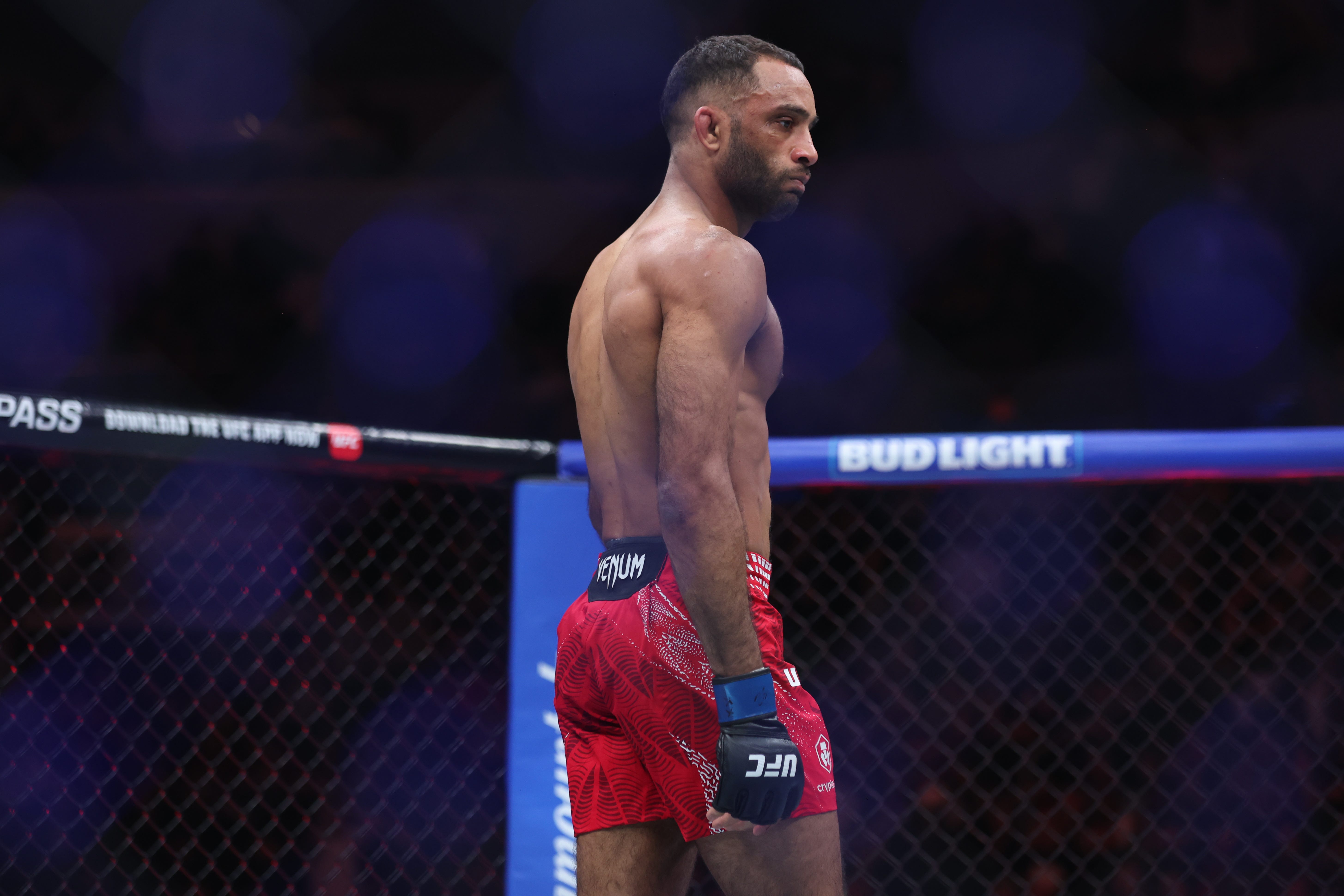Apr 18, 2026; Winnipeg, Manitoba, CANADA; Jai Herbert (blue gloves) reacts after defeating Mandel Nallo (red gloves) during UFC Fight Night at Canada Life Centre. Mandatory Credit: Bruce Fedyck-Imagn Images