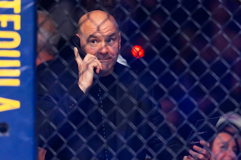 UFC president Dana White on the phone alongside the Octagon during UFC 329 at T-Mobile Arena.