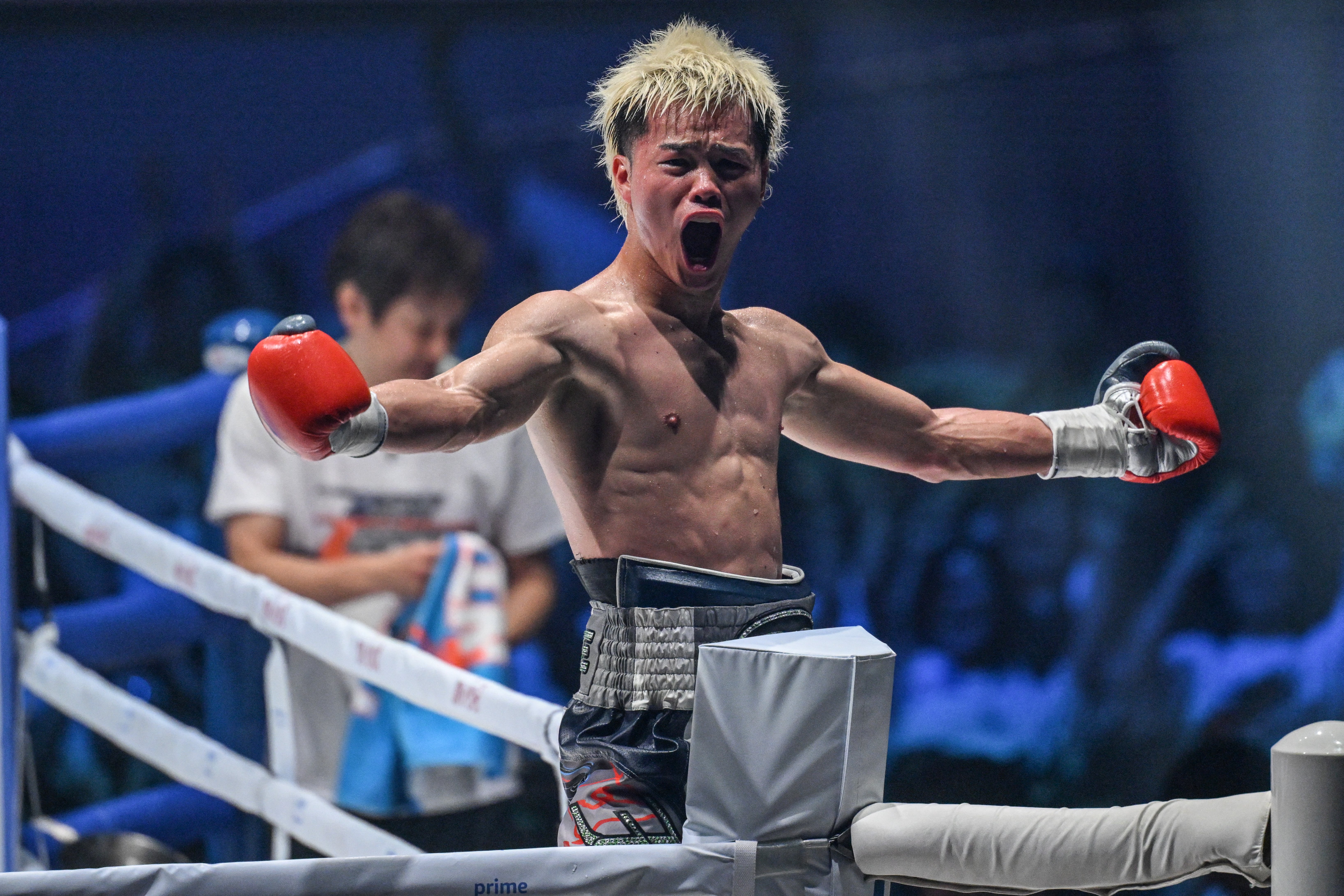 TOPSHOT - Japan's Tenshin Nasukawa celebrates his victory over USA's Jonathan Rodriguez in their junior featherweights boxing match at Ryogoku Kokugikan in Tokyo on July 20, 2024. (Photo by Yuichi YAMAZAKI / AFP) (Photo by YUICHI YAMAZAKI/AFP via Getty Images)