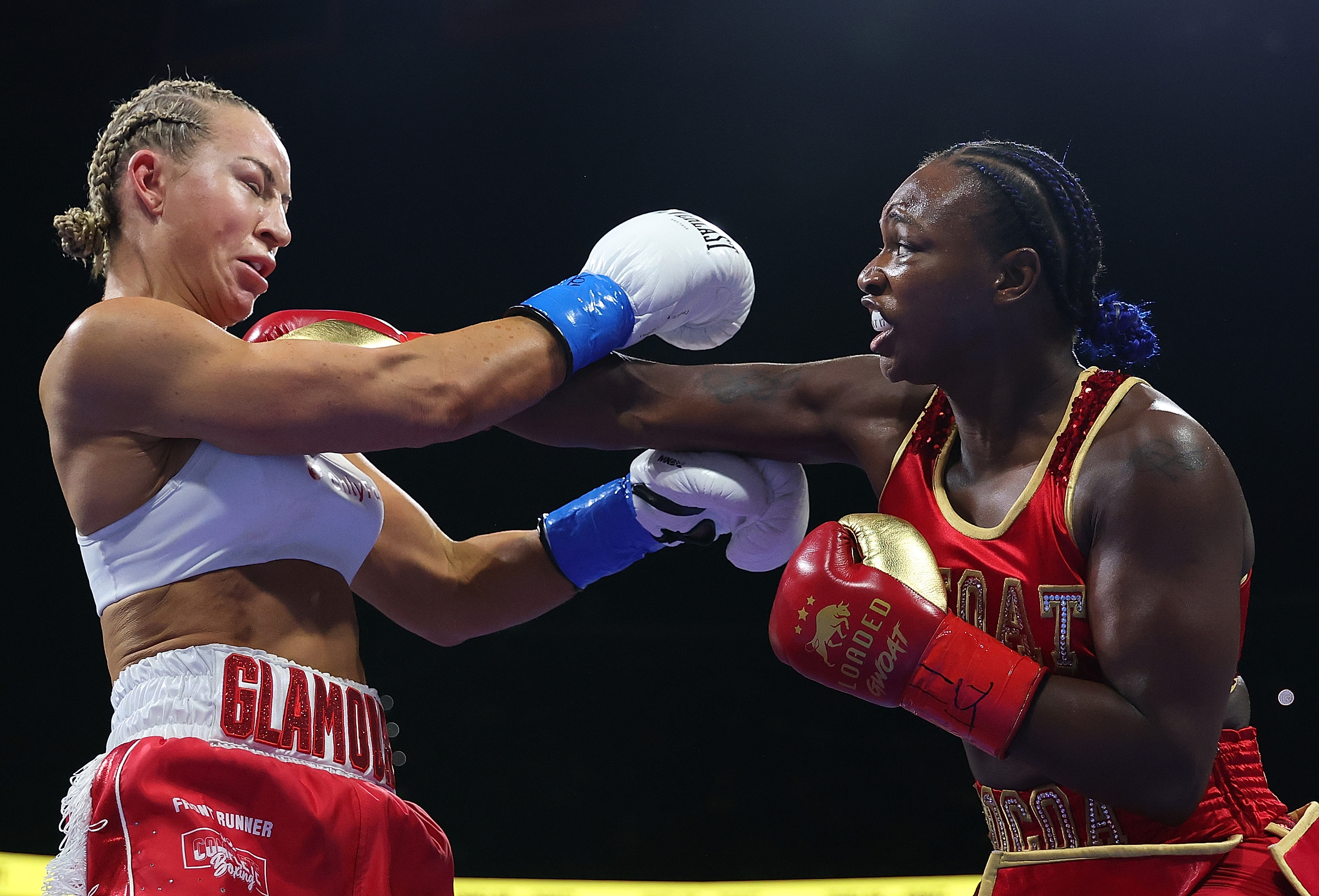 ATLANTA, GEORGIA - AUGUST 16: Claressa Shields throws a punch at Kaye Scott of Australia during the first round of their WBC World & WBA World Female Middleweight Title bout at State Farm Arena on August 16, 2026 in Atlanta, Georgia. (Photo by Kevin C. Cox/Getty Images)