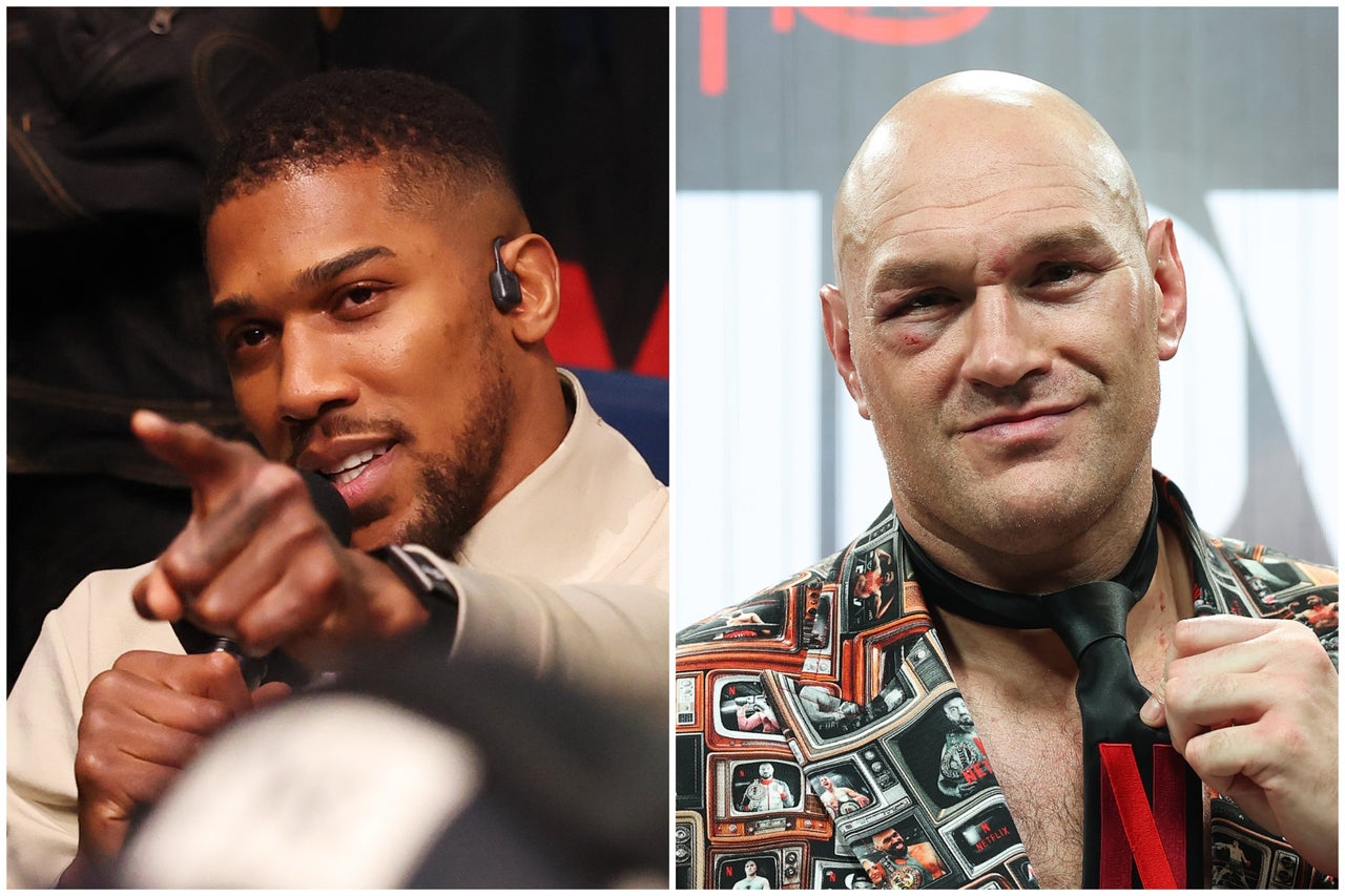 Anthony Joshua (left) and Tyson Fury, both pictured on 11 April (Getty Images)