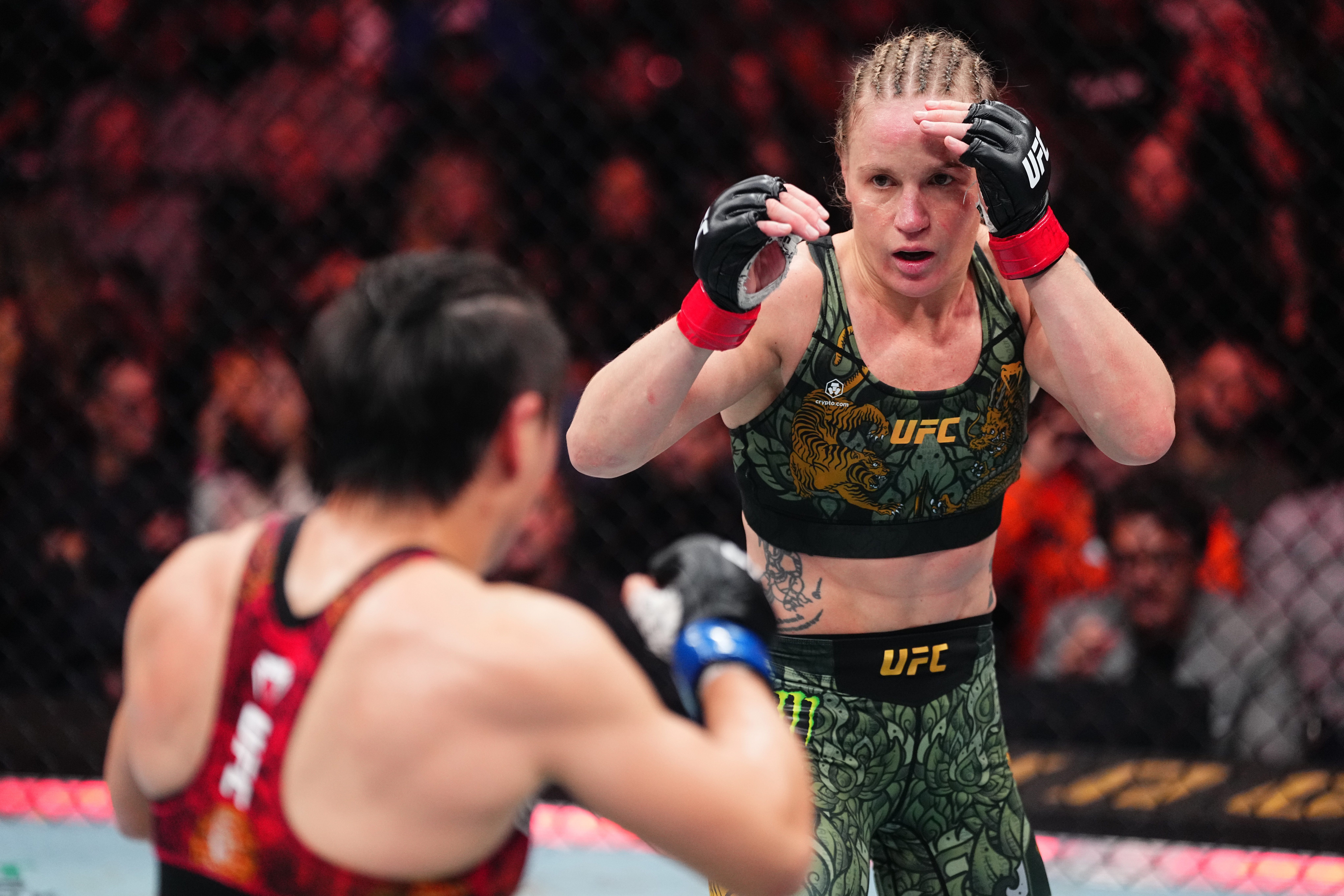 NEW YORK, NEW YORK - NOVEMBER 15: (R-L) Valentina Shevchenko of Kyrgyzstan battles Zhang Weili of China in the UFC flyweight championship fight during the UFC 322 event at Madison Square Garden on November 15, 2025 in New York City. (Photo by Jeff Bottari/Zuffa LLC)