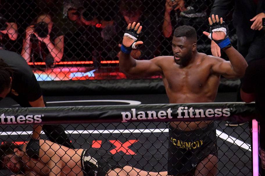 Francis Ngannou (blue gloves) reacts after fighting Philipe Lins (red gloves) in a heavyweight bout at Intuit Dome.