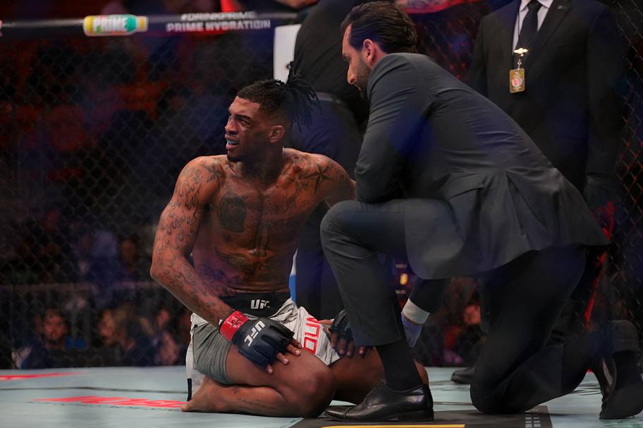 Sedriques Dumas (red gloves) reacts after his loss to Michal Oleksiejczuk (not pictured) during UFC 314 at Kaseya Center.