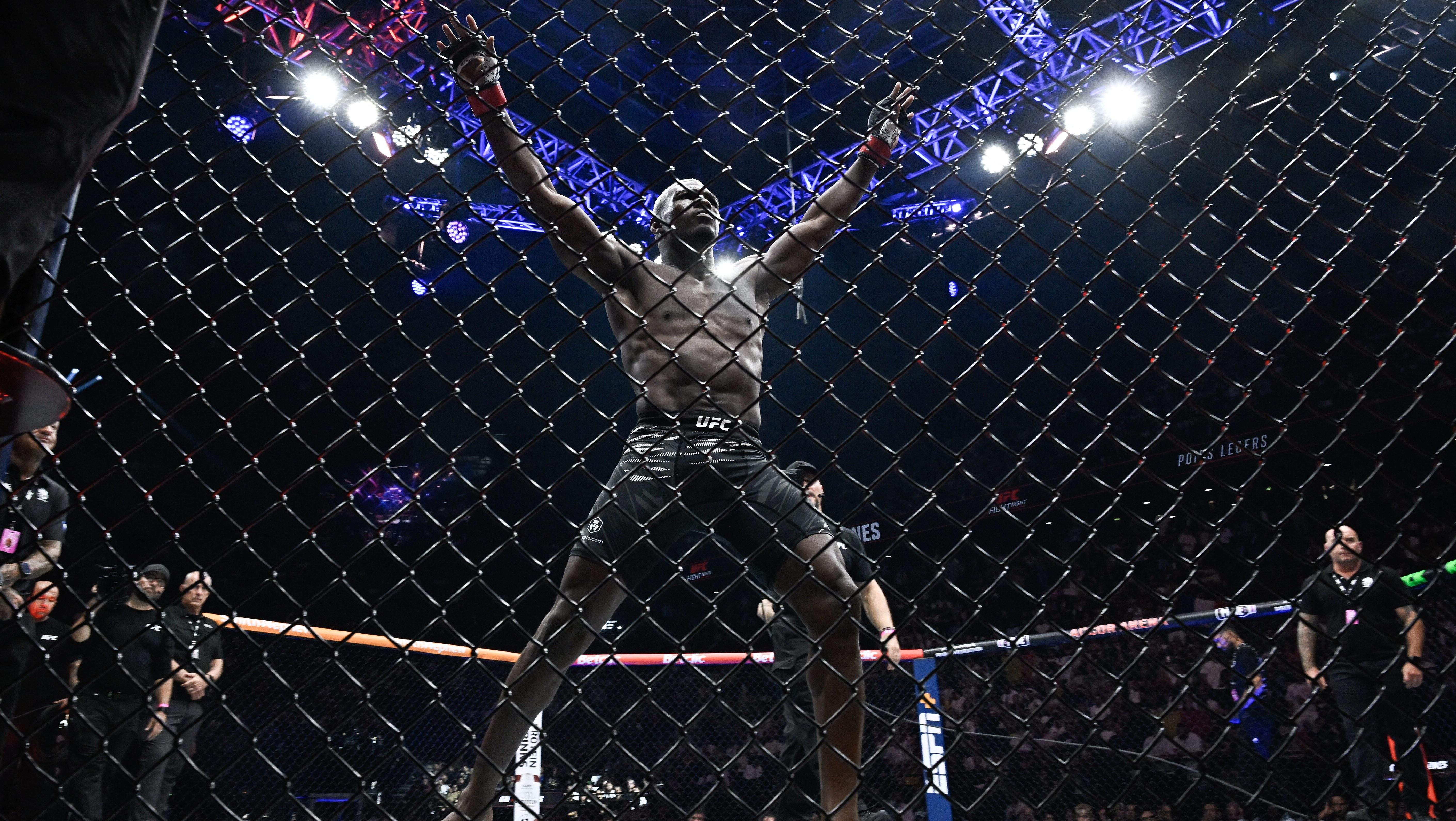 Belgium's Bolaji Oki cheers on the audience prior to the bout against Wales's Mason Jones during their mixed martial arts at the 4th edition of the Ultimate Fighting Championship (UFC) lightweights at the Bercy Accor Arena, in Paris, on September 6, 2025. (Photo by JULIEN DE ROSA / AFP via Getty Images)