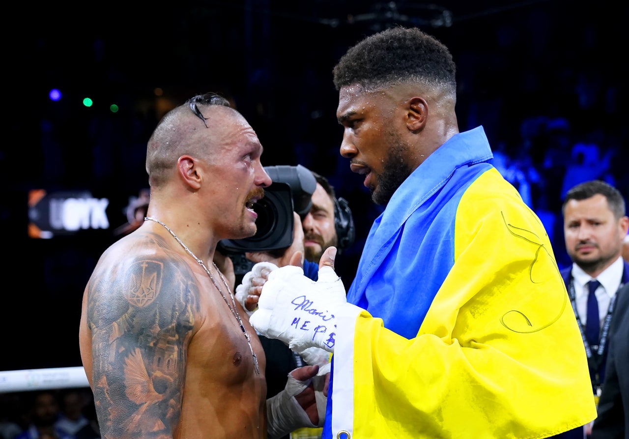 Anthony Joshua with Usyk after their second clash (PA Wire)