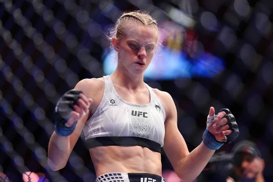 Juliana Miller (red gloves) fights Carli Judice (blue gloves) in a womens flyweight bout during UFC Fight Night at Toyota Cen