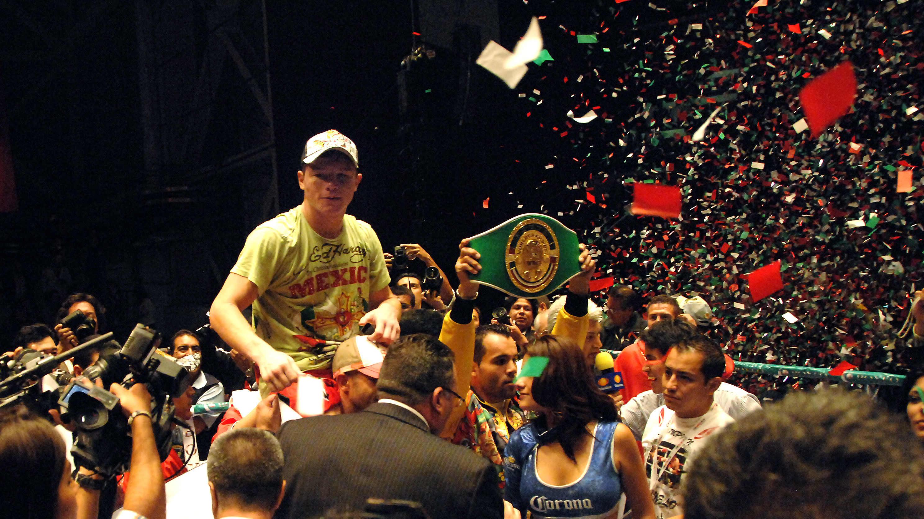 PUEBLA, MEXICO - SEPTEMBER 15: Mexico's boxer Saul Alvarez cheers with the WCB youthful Welterweight world championship belt after winning a fight against Argentina's Carlos Herrera at the Auditorio Siglo XXI on September 15, 2009 in Puebla, Mexico (Photo by Jaime Lopez/Jam Media/LatinContent via Getty Images)