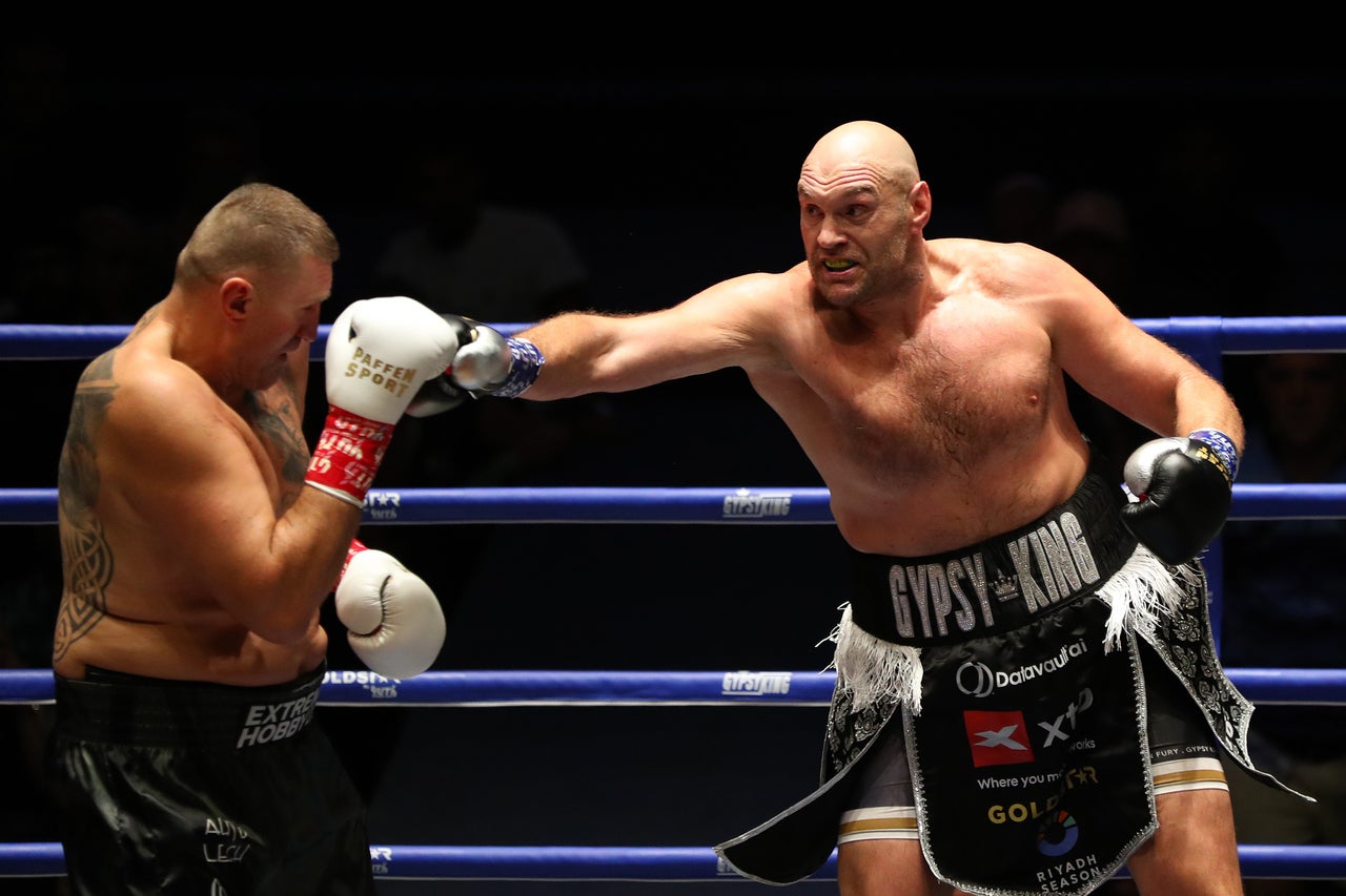 Tyson Fury eased past Mariusz Wach in July, one day before Joshua beat Kristian Prenga (Getty)