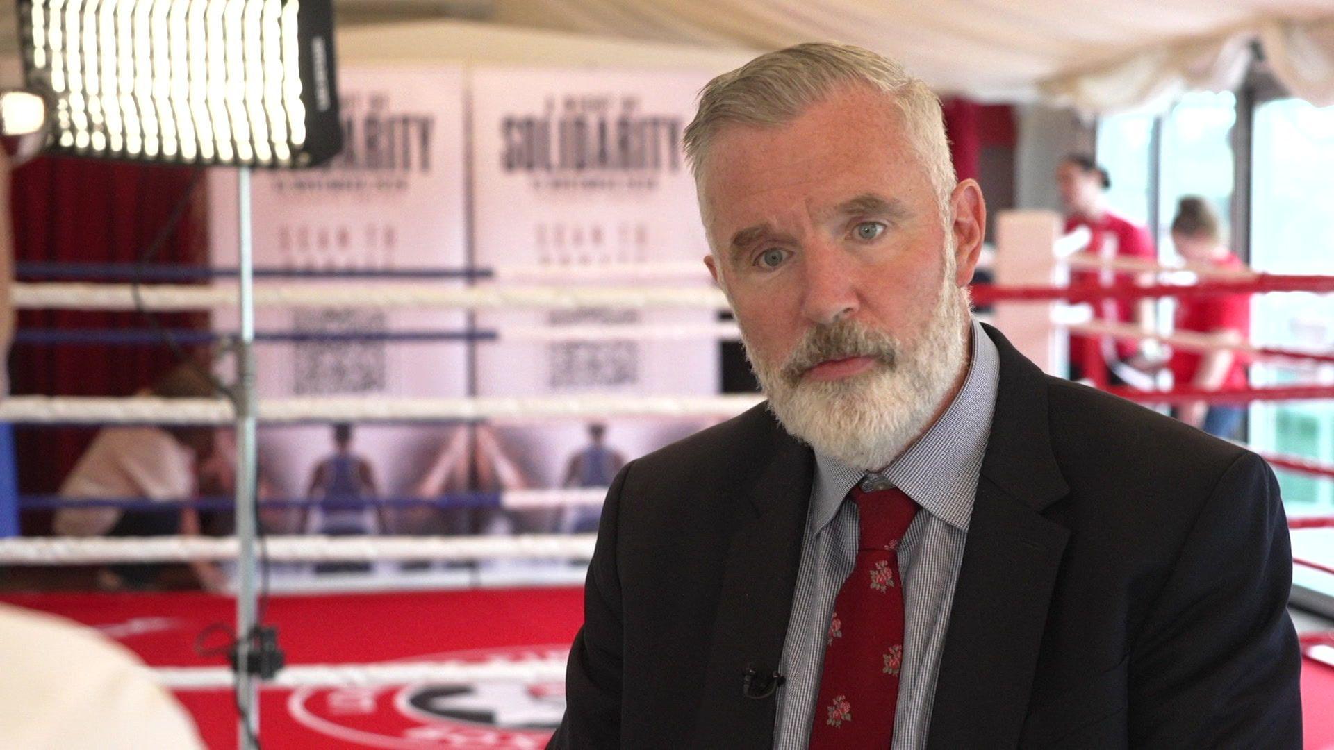 Lord Roe of West Wickham in front of the boxing ring