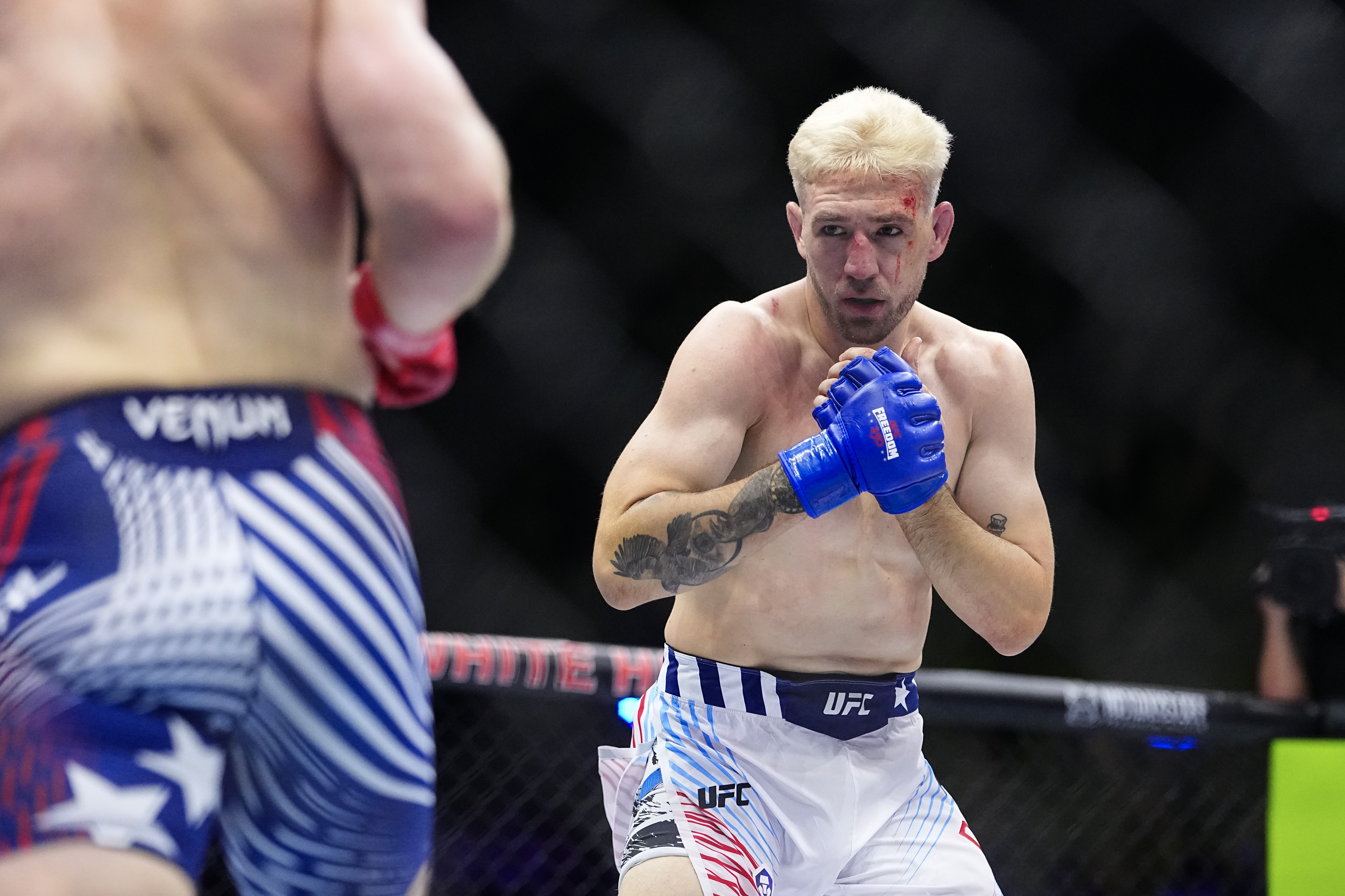 WASHINGTON, DC - JUNE 14: Kyle Daukaus fights Bo Nickal in a middleweight fight during the UFC Freedom 250 event on the South Lawn at the White House on June 14, 2026 in Washington, DC. (Photo by Chris Unger/Zuffa LLC)