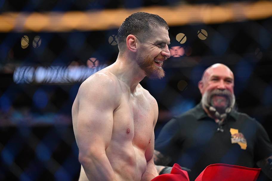 Edmen Shahbazyan (red gloves) reacts after defeating Brunno Ferreira (blue gloves) during UFC 331 at Crypto.com Arena.