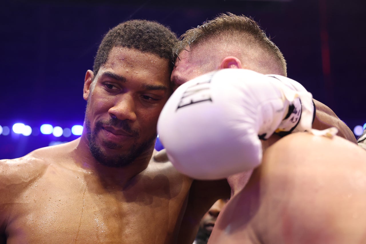 Anthony Joshua (left) with Kristian Prenga after beating the Albanian (Getty)