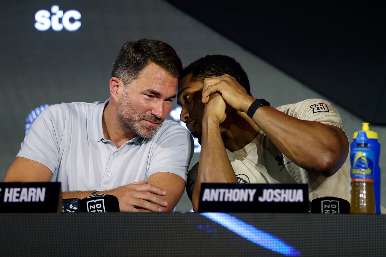 Anthony Joshua with his promoter Eddie Hearn (Getty)