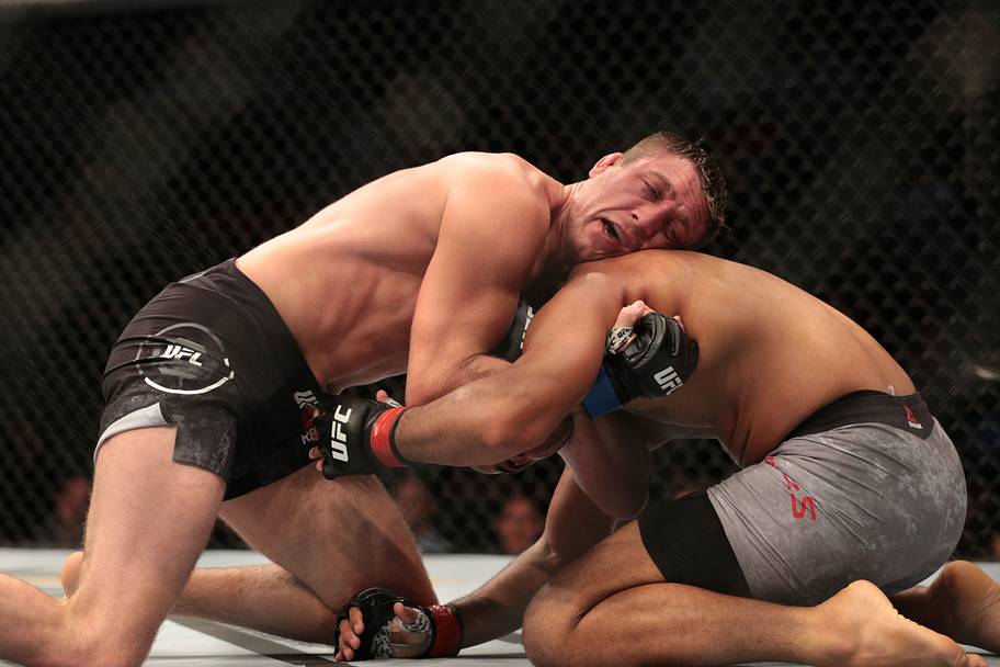 Gerald Meerschaert (blue gloves) fights Trevin Giles (red gloves) during UFC Fight Night at Prudential Center.