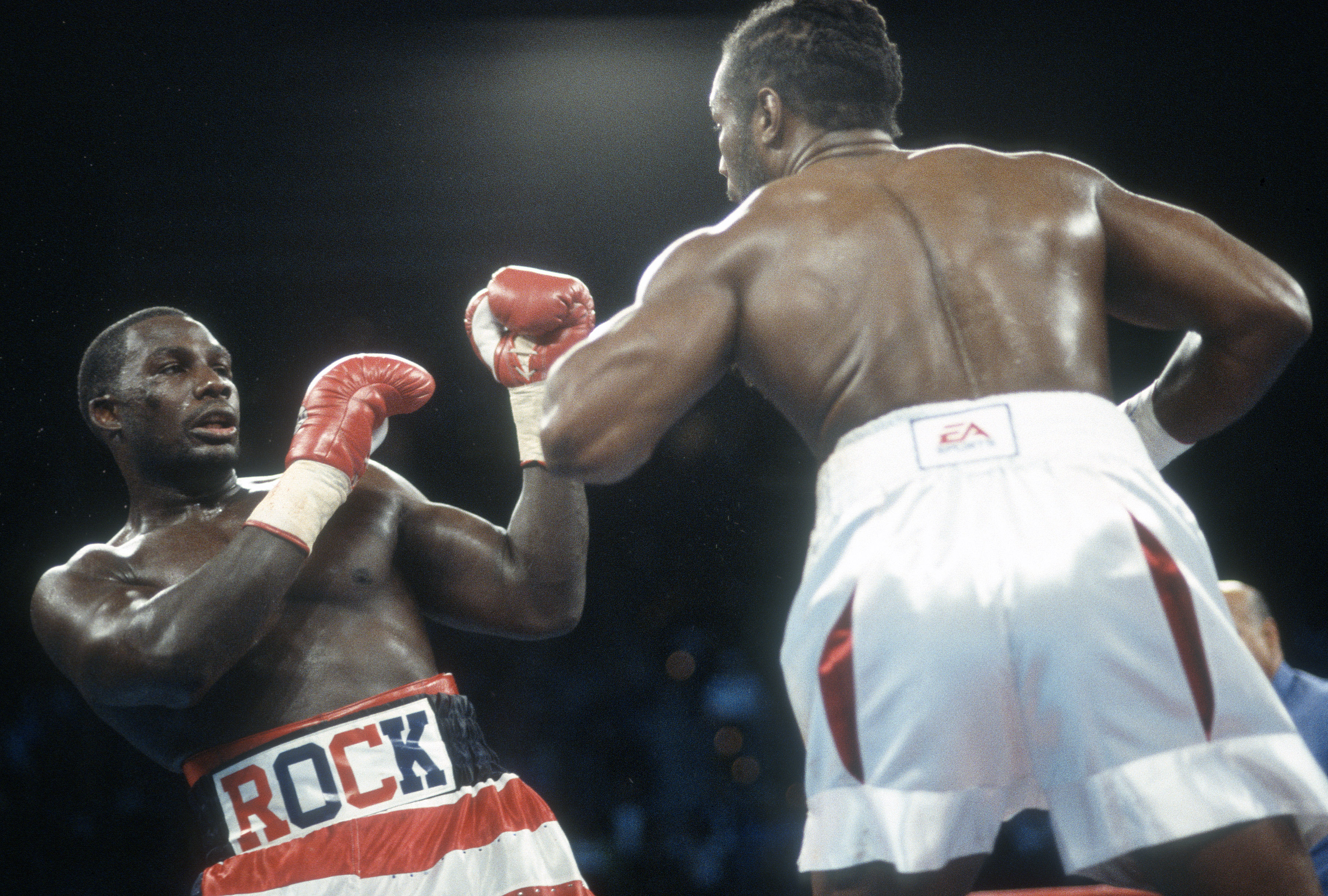LAS VEGAS - NOVEMBER 17: Lennox Lewis and Hasim Rahman for the WBC, IBO, IBF and Lineal heavyweight titles on November 17, 2001 at the Mandalay Bay Events Center in Las Vegas, Nevada. Lewis won the fight with a 5th round KO. (Photo by Focus on Sport/Getty Images)