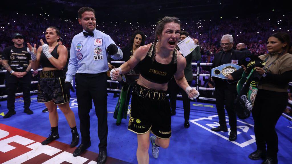 Katie Taylor roars as she is announced the winner