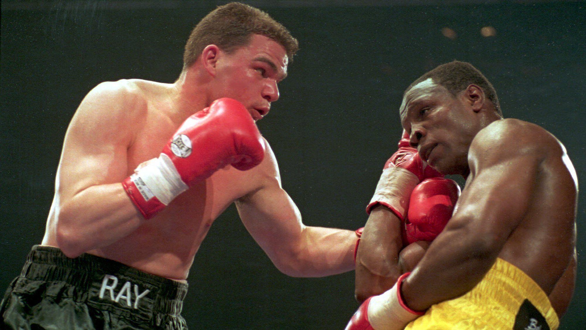Ray Close and Chris Eubank in action at the King's Hall in 1994